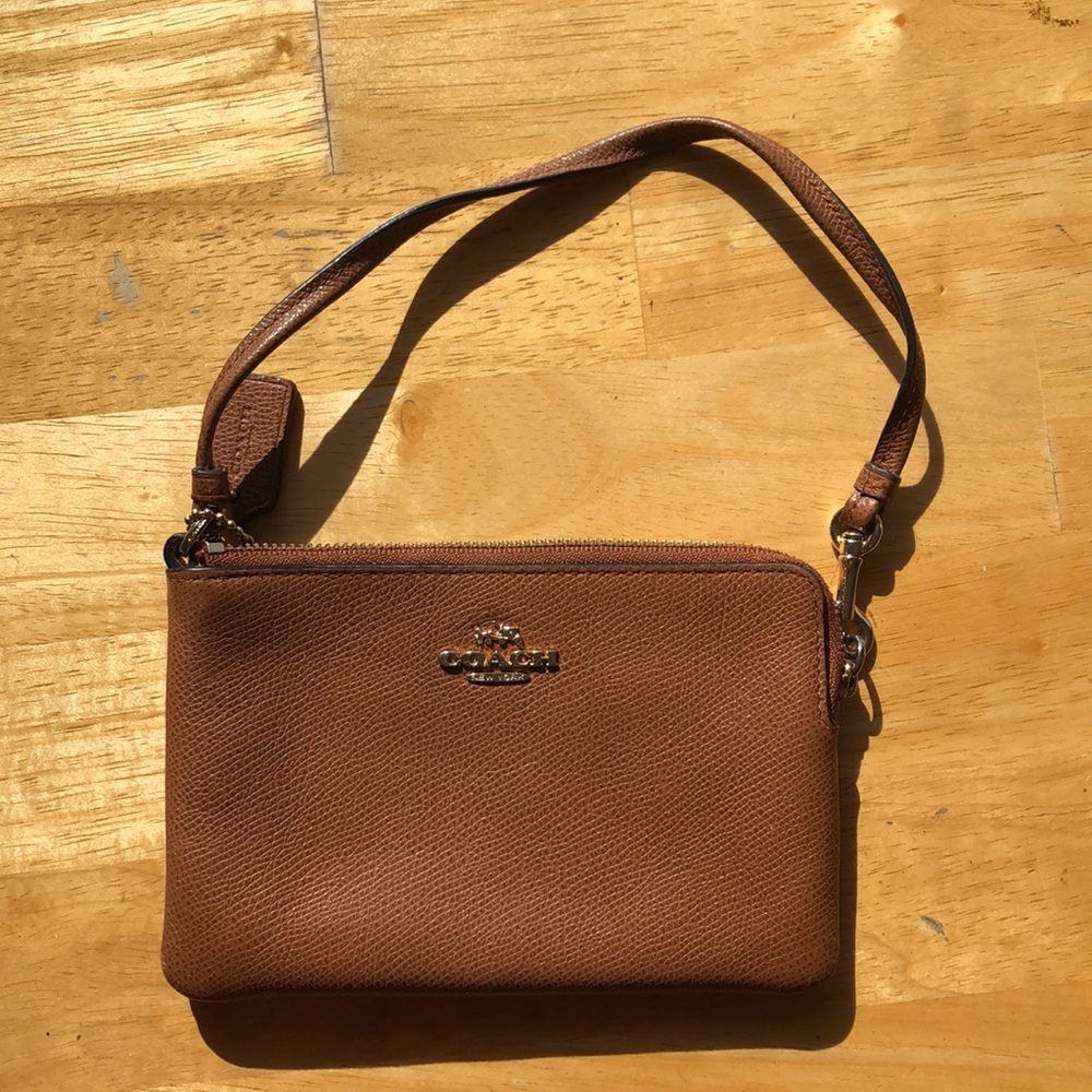 Camel coach clutch/wristlet